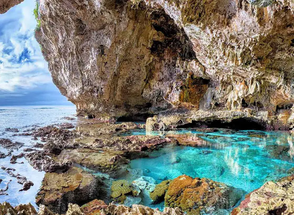 Niue sea cave and crystal-clear rock pool